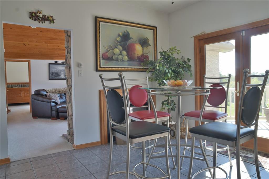450 Dick Station Road Irwin, PA 15642 - Photo 4 of 24 Inside the large kitchen area is where family and friends meet. French doors allow for easy access to deck for ultimate party environment.
