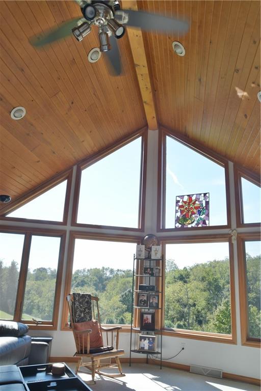450 Dick Station Road Irwin, PA 15642 - Photo 8 of 24 The crown of this beauty is the wall of glass that allows for majestic views.