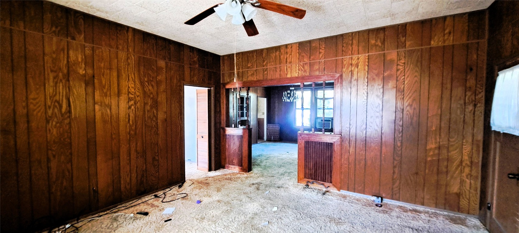507 Sloan Street Taylor, TX 76574 - Photo 6 of 11 a view of a hallway with wooden shelves