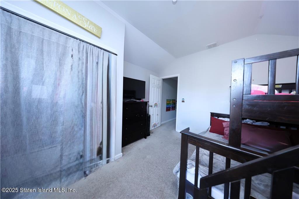 20 Buel Avenue, Unit A Staten Island, NY 10304 - Photo 13 of 30 a workspace with furniture and window