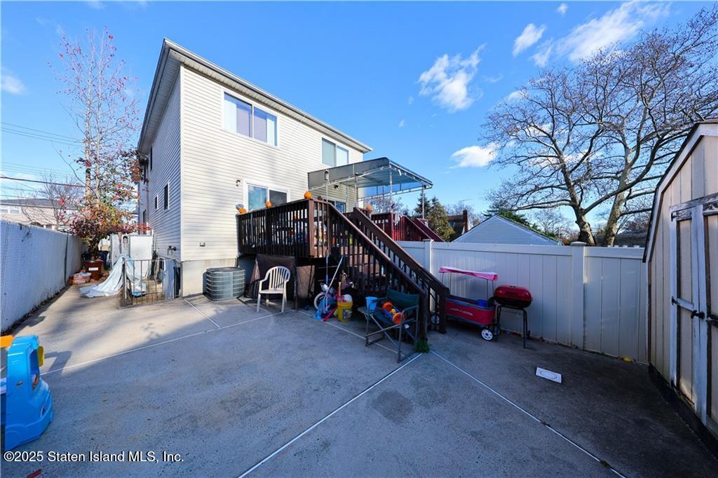 20 Buel Avenue, Unit A Staten Island, NY 10304 - Photo 24 of 30 a view of a children in front of house