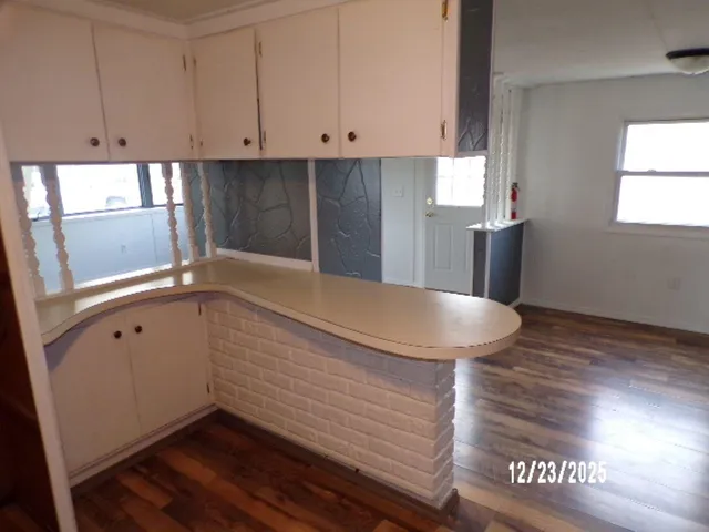 a view of a kitchen with window