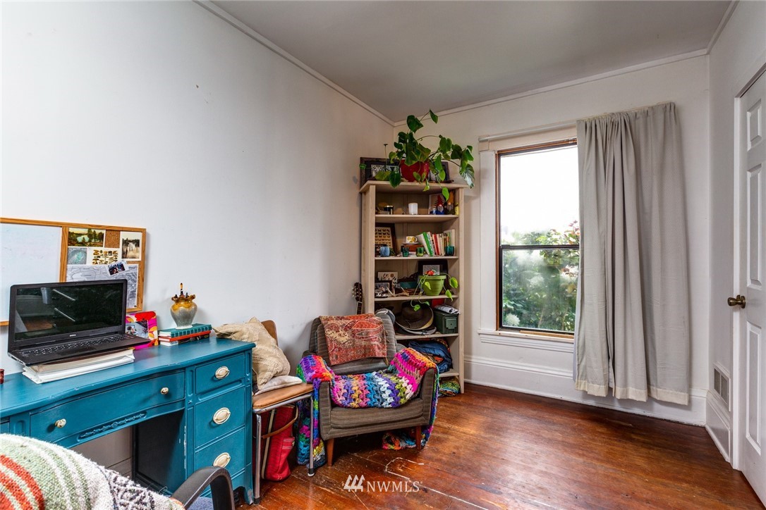 1717 Monroe Street Bellingham, WA 98225 - Photo 11 of 37 a living room with furniture and a flat screen tv