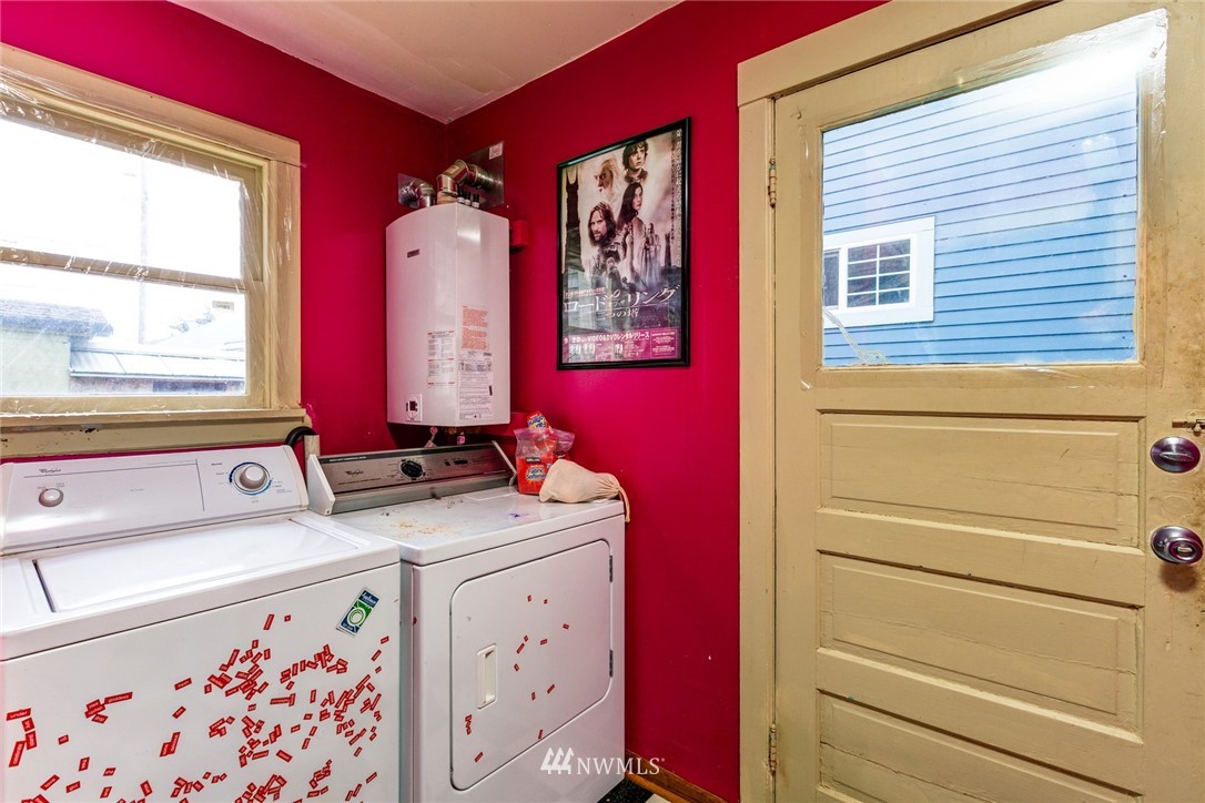 1717 Monroe Street Bellingham, WA 98225 - Photo 17 of 37 a view of bathroom with a sink a window and a dresser