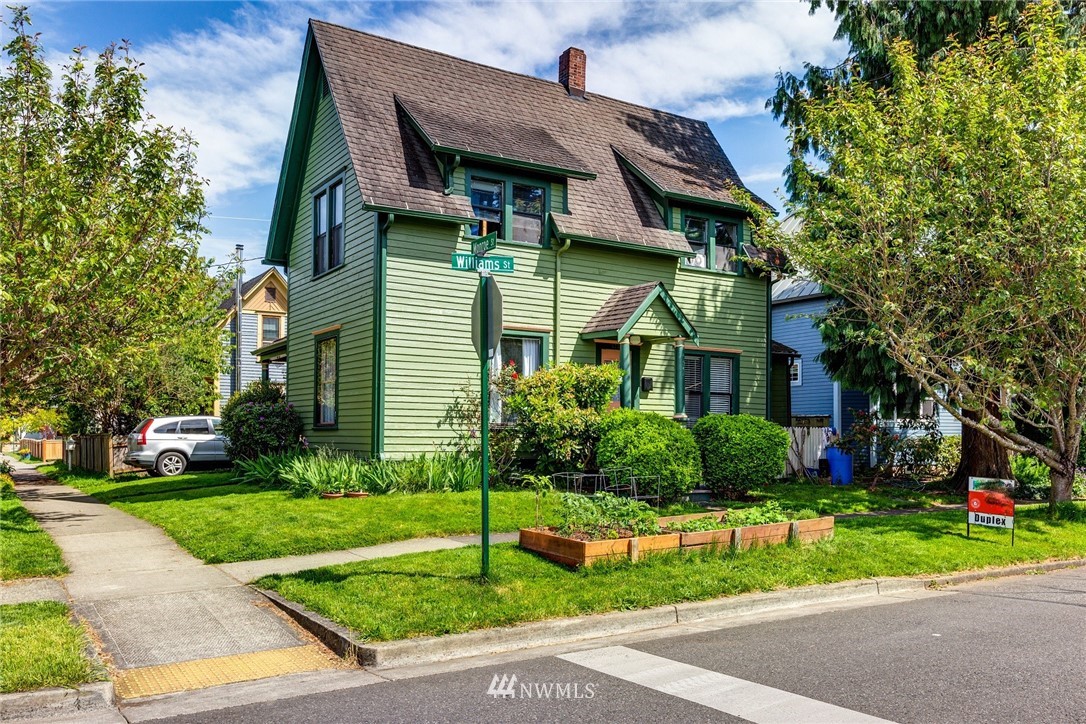 1717 Monroe Street Bellingham, WA 98225 - Photo 18 of 37 a view of a house with a yard and plants