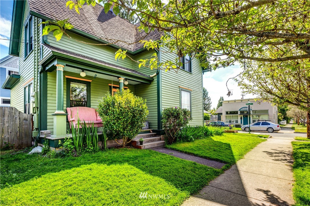1717 Monroe Street Bellingham, WA 98225 - Photo 3 of 37 a view of a house with a yard