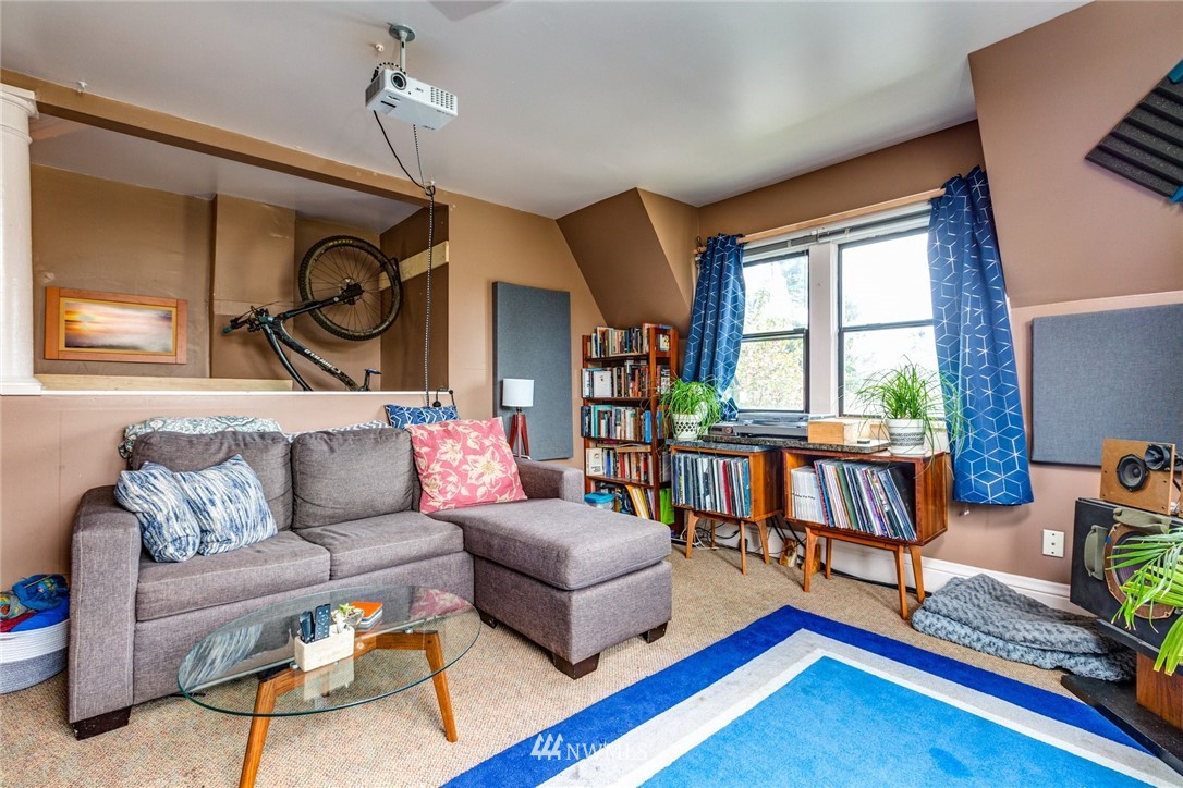 1717 Monroe Street Bellingham, WA 98225 - Photo 24 of 37 a living room with furniture and a rug