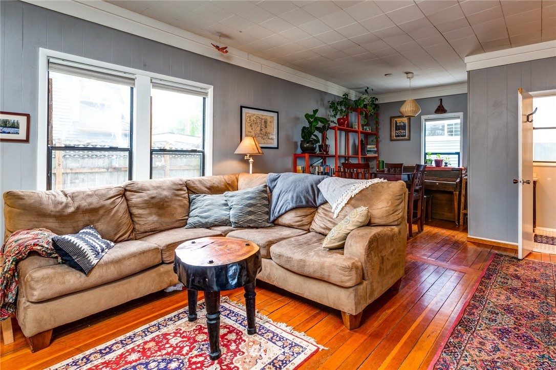 1717 Monroe Street Bellingham, WA 98225 - Photo 4 of 37 a living room with furniture and a large window