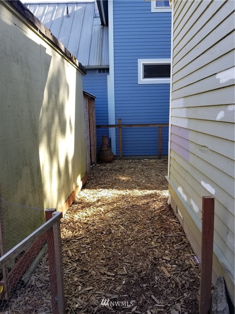 1717 Monroe Street Bellingham, WA 98225 - Photo 35 of 37 a view of a house with a yard
