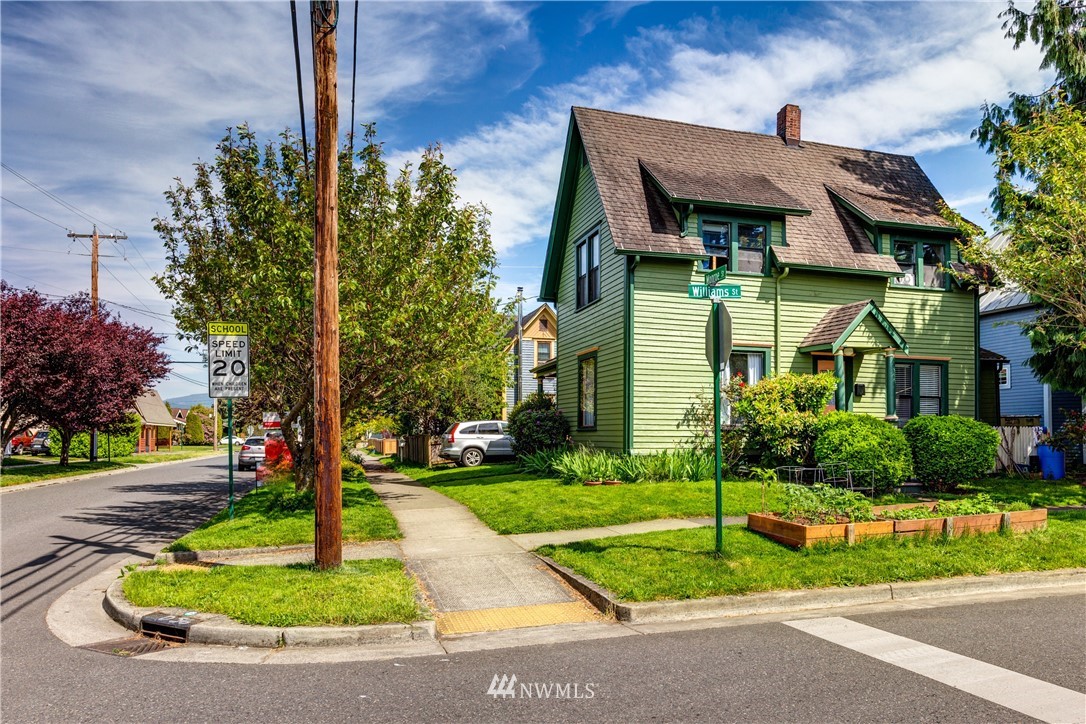 1717 Monroe Street Bellingham, WA 98225 - Photo 37 of 37 a front view of a house with a yard