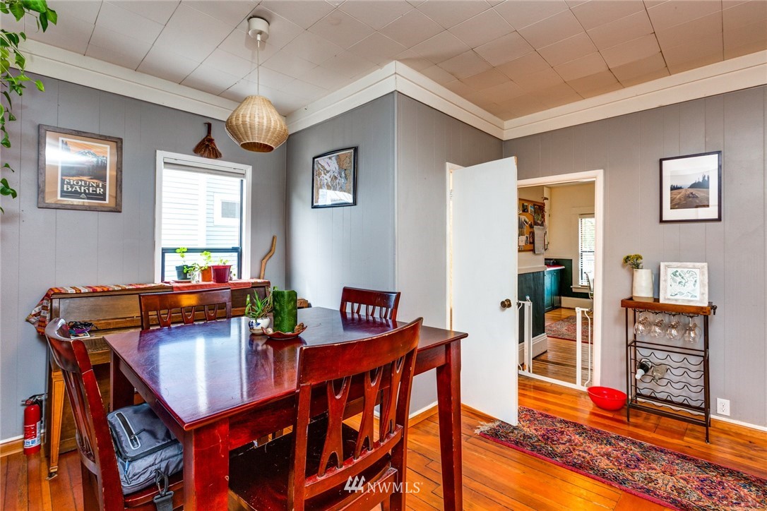 1717 Monroe Street Bellingham, WA 98225 - Photo 8 of 37 a living room with furniture and wooden floor