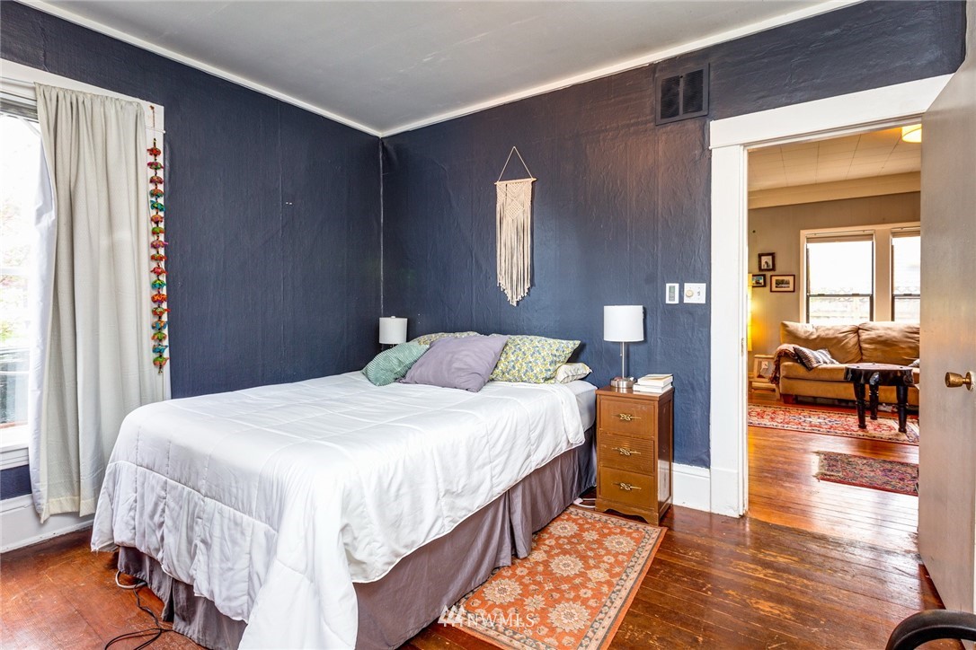 1717 Monroe Street Bellingham, WA 98225 - Photo 10 of 37 a bedroom with a bed and a view of balcony