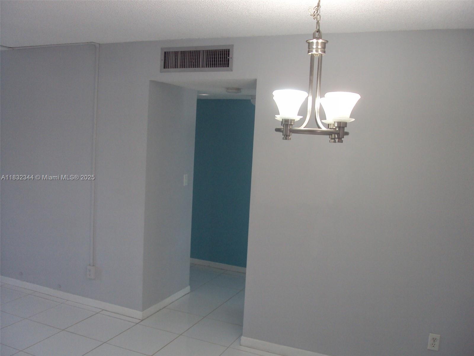 Davie Davie, FL 33328 - Photo 3 of 4 a view of a chandelier fan and entryway