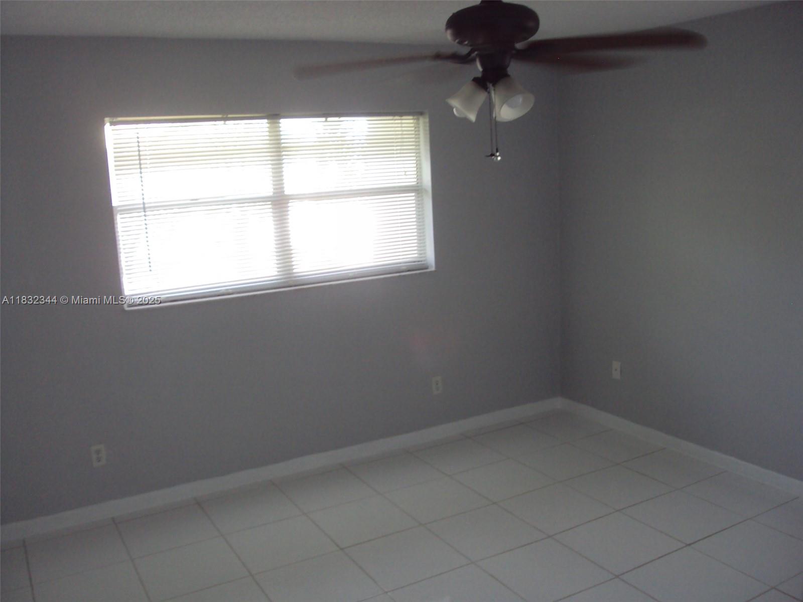 Davie Davie, FL 33328 - Photo 4 of 4 an empty room with a window
