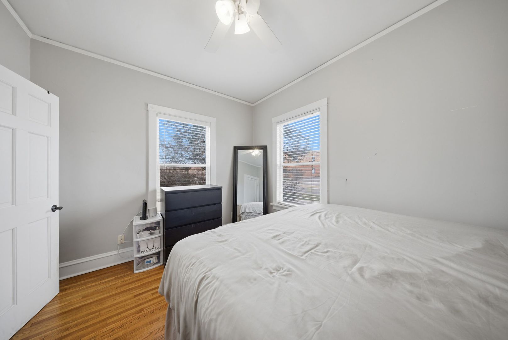 1059 Larkin Avenue Elgin, IL 60123 - Photo 11 of 25 a bedroom with a bed and a dresser