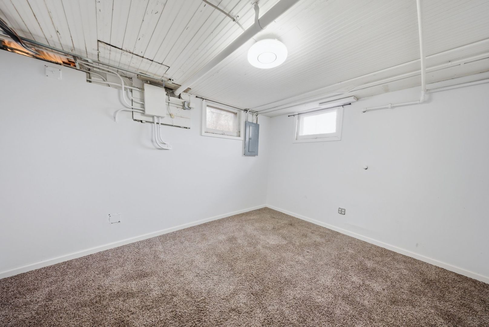 1059 Larkin Avenue Elgin, IL 60123 - Photo 18 of 25 a view of a room with racks on the wall