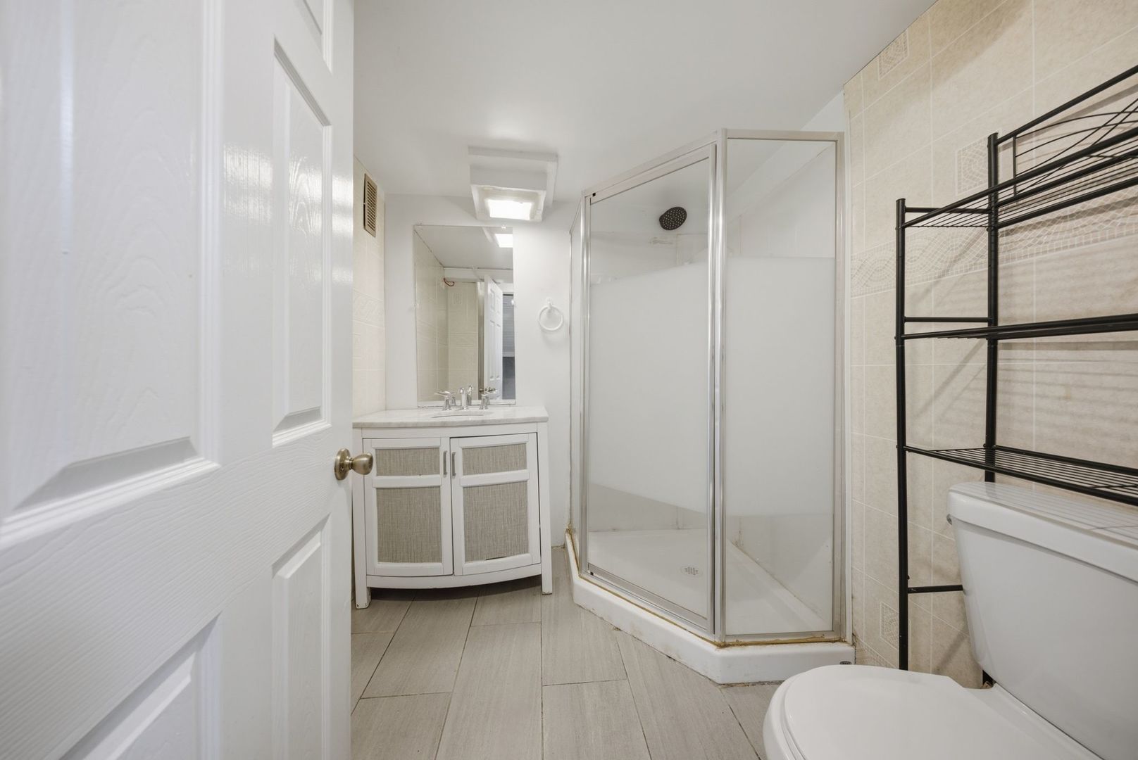 1059 Larkin Avenue Elgin, IL 60123 - Photo 20 of 25 a bathroom with a shower and a toilet