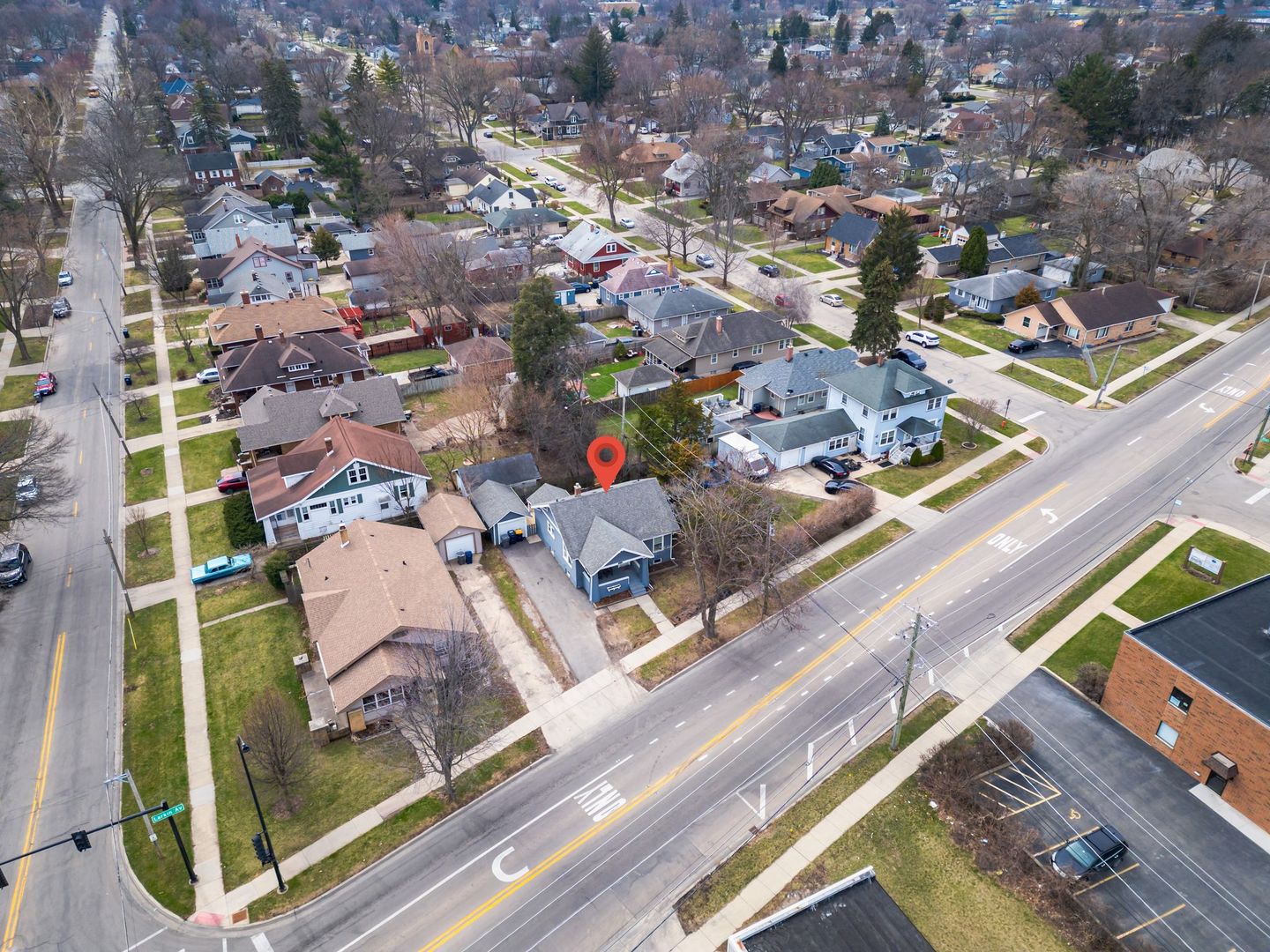 1059 Larkin Avenue Elgin, IL 60123 - Photo 25 of 25 an aerial view of a residential apartment building with a yard