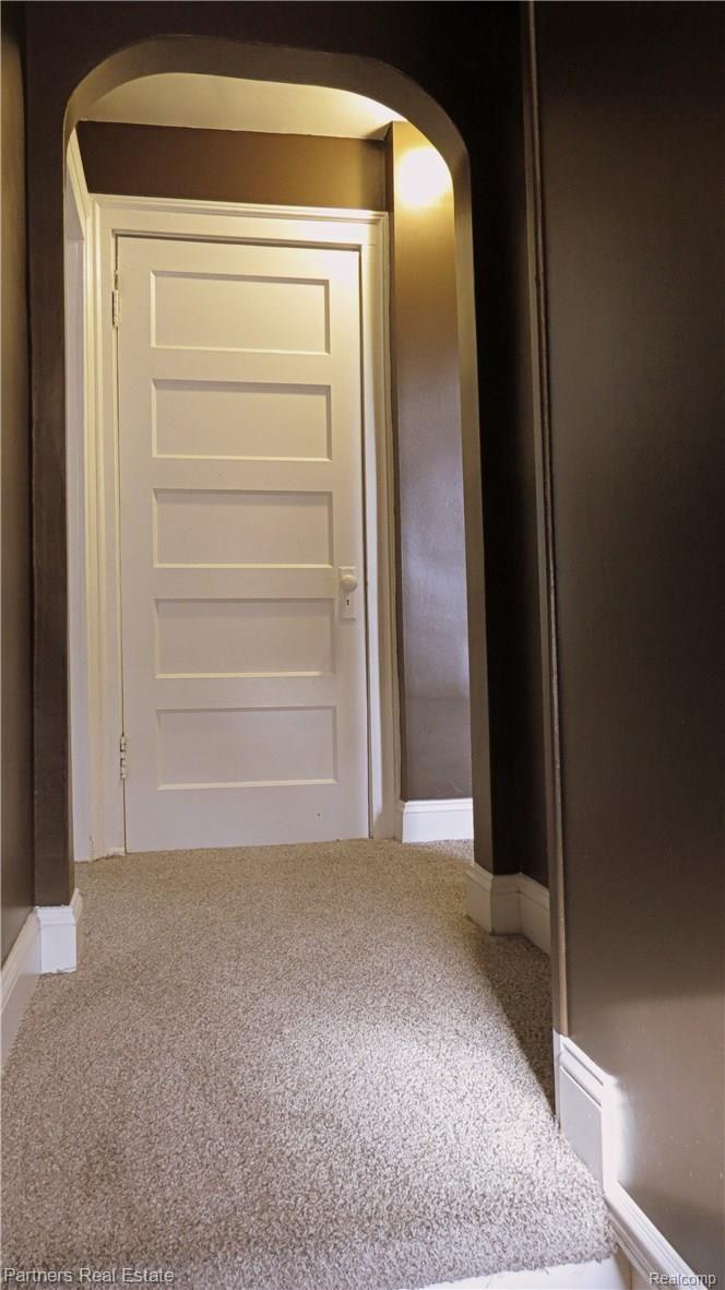 4524 Pinckney Road Howell, MI 48843 - Photo 27 of 58 16a. Upper Level hall to three bedrooms