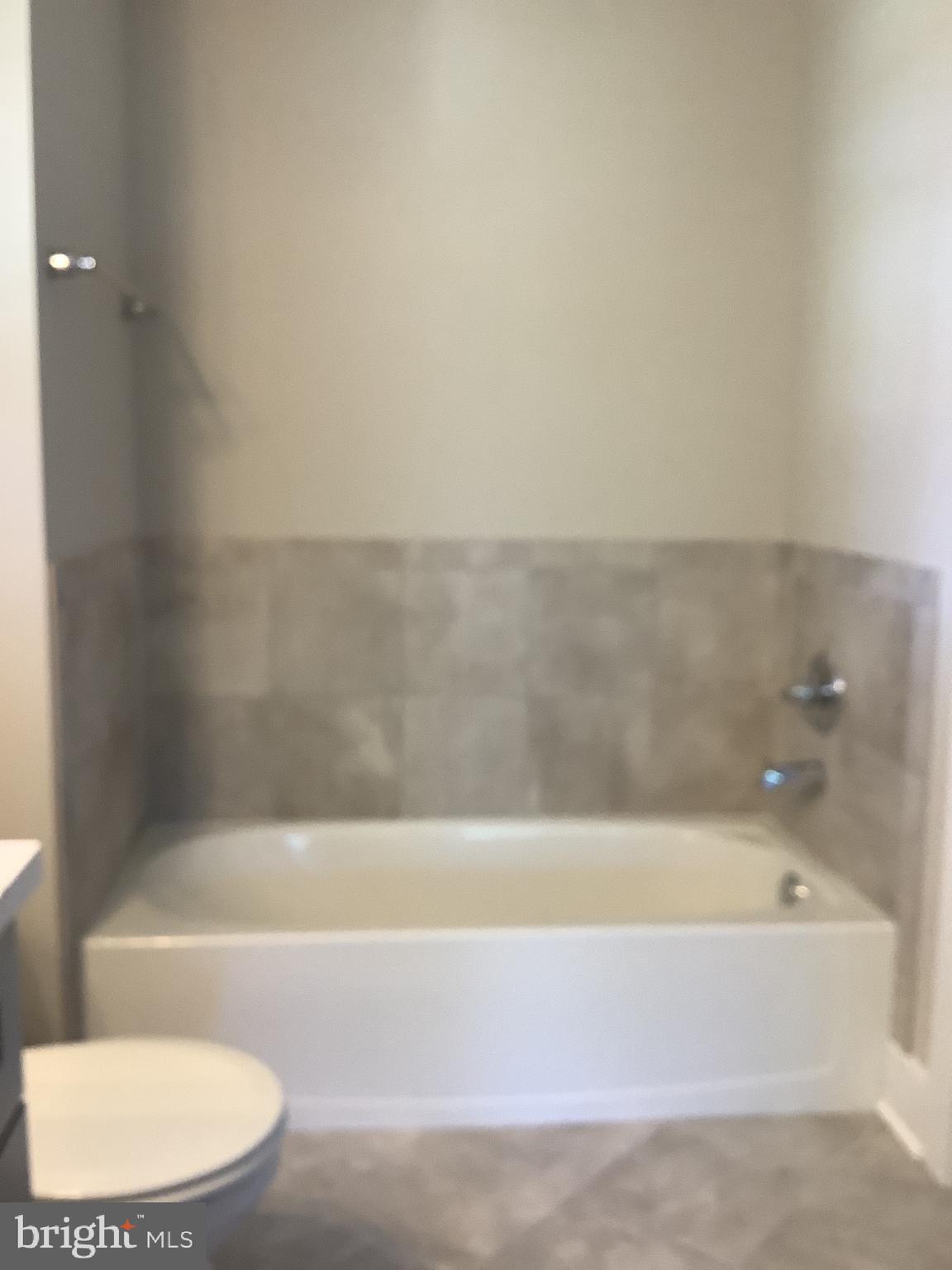 7862 Outing Avenue Pasadena, MD 21122 - Photo 11 of 19 Bathtub in Primary Bath