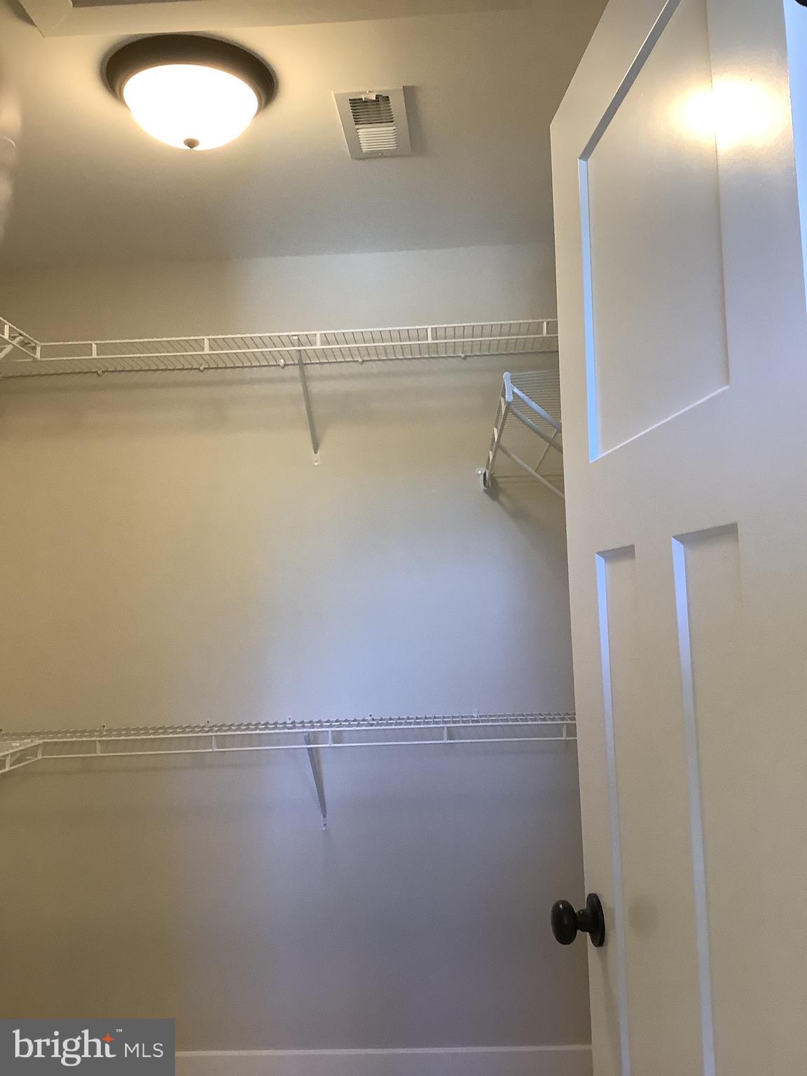 7862 Outing Avenue Pasadena, MD 21122 - Photo 13 of 19 Walk in closet