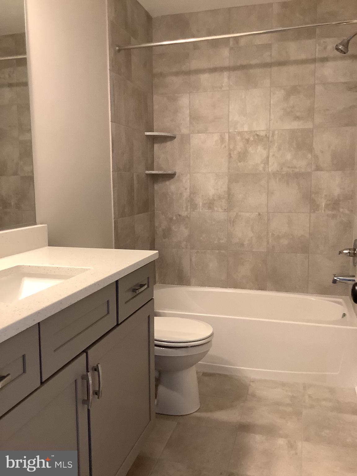 7862 Outing Avenue Pasadena, MD 21122 - Photo 18 of 19 Upper Level Hall Bathroom