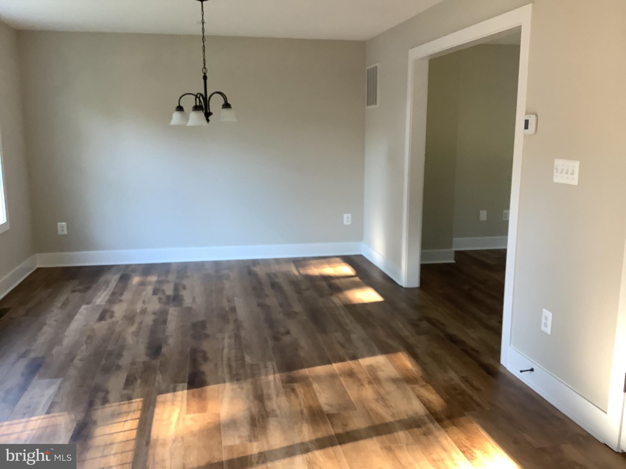 7862 Outing Avenue Pasadena, MD 21122 - Photo 4 of 19 Looking from Kitchen toward Dining Area