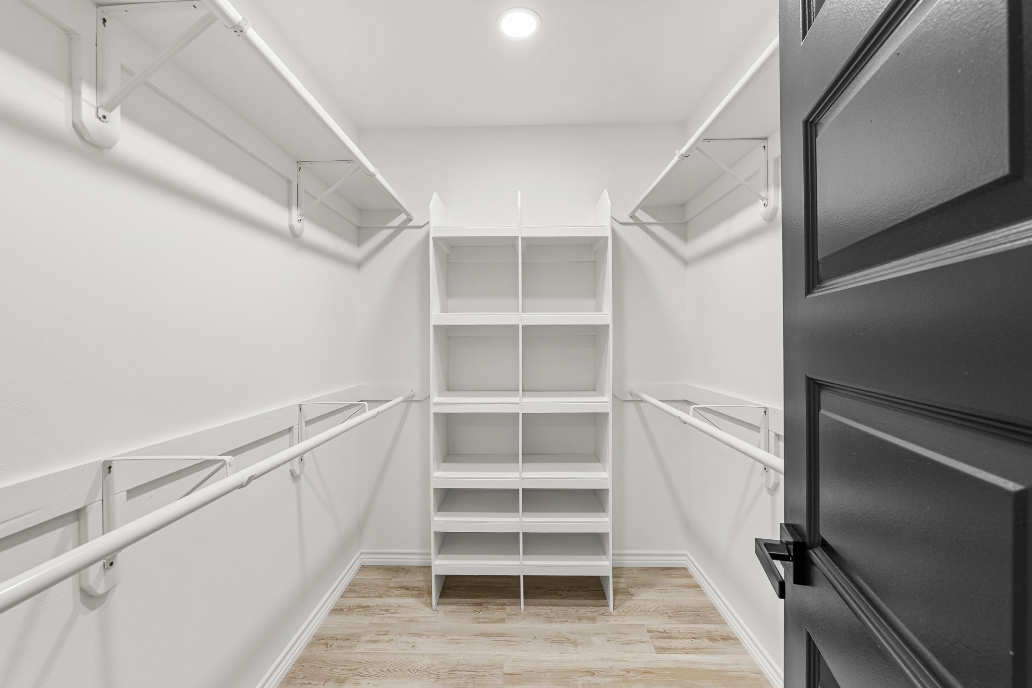 90 Cool Crest Point Blank, TX 77364 - Photo 16 of 40 a view of walk in closet with empty racks