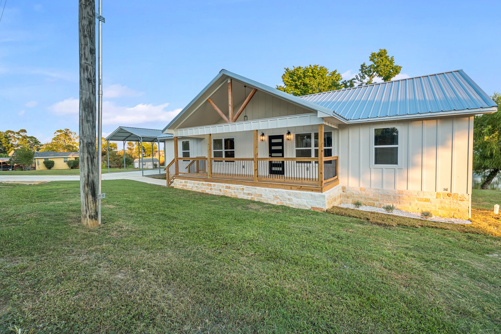 90 Cool Crest Point Blank, TX 77364 - Photo 22 of 40 a view of a house with a backyard and a porch