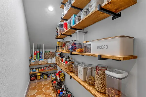 a bed room with a bed and a window