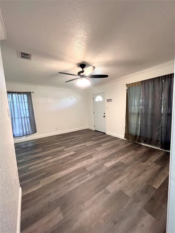 1324 Maple Drive Garland, TX 75040 - Photo 3 of 10 a view of an empty room