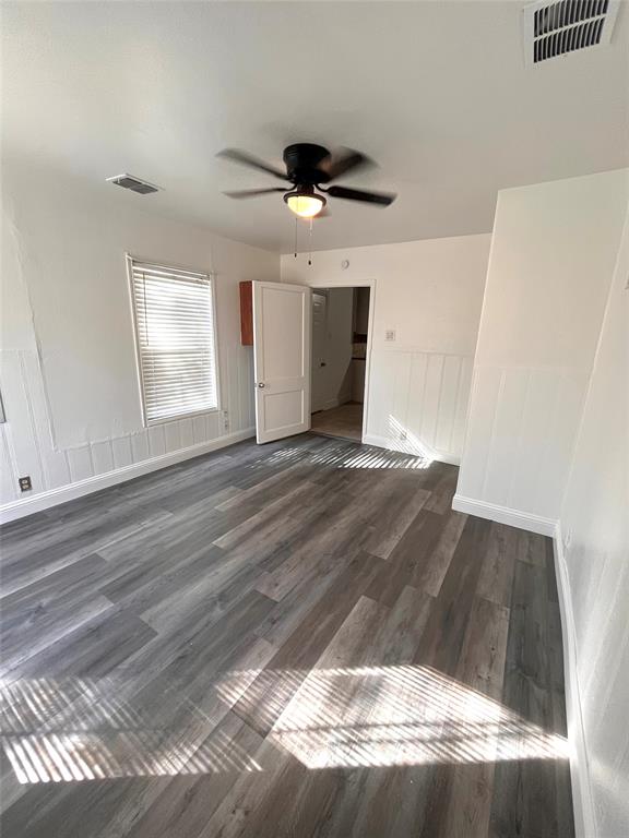 1324 Maple Drive Garland, TX 75040 - Photo 9 of 10 a view of empty room with wooden floor