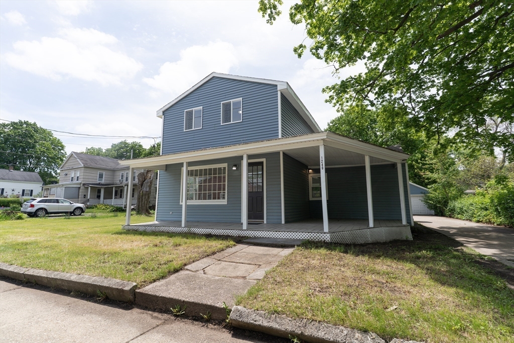 1240 South Main Street Palmer, MA 01069 - Photo 27 of 31 front view of a house with a yard
