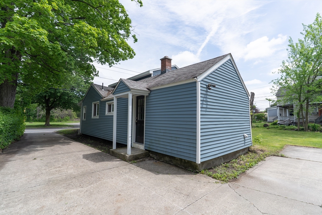 1240 South Main Street Palmer, MA 01069 - Photo 29 of 31 a view of a house with a yard
