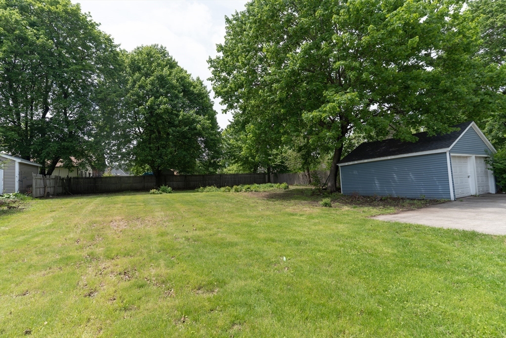 1240 South Main Street Palmer, MA 01069 - Photo 30 of 31 a backyard of a house with lots of green space