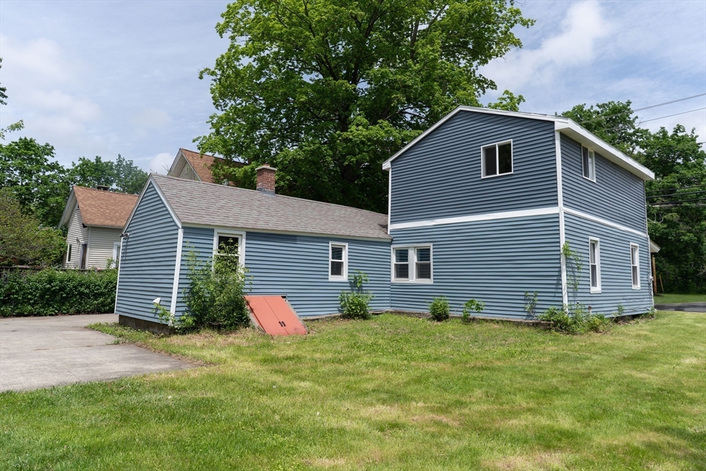 1240 South Main Street Palmer, MA 01069 - Photo 31 of 31 a front view of house with yard and trees