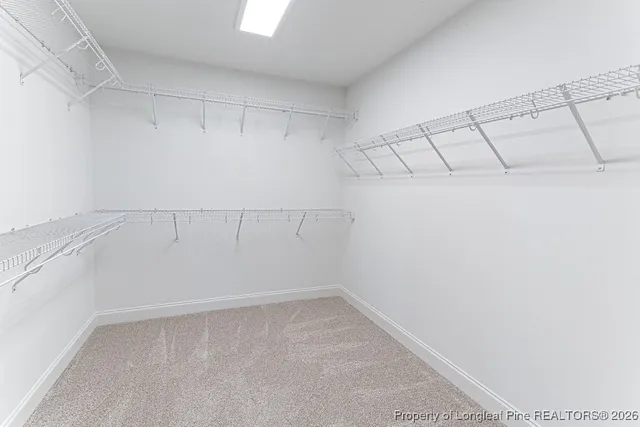 a view of a room with racks on the wall