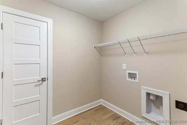 a view of a room with rack on the wall