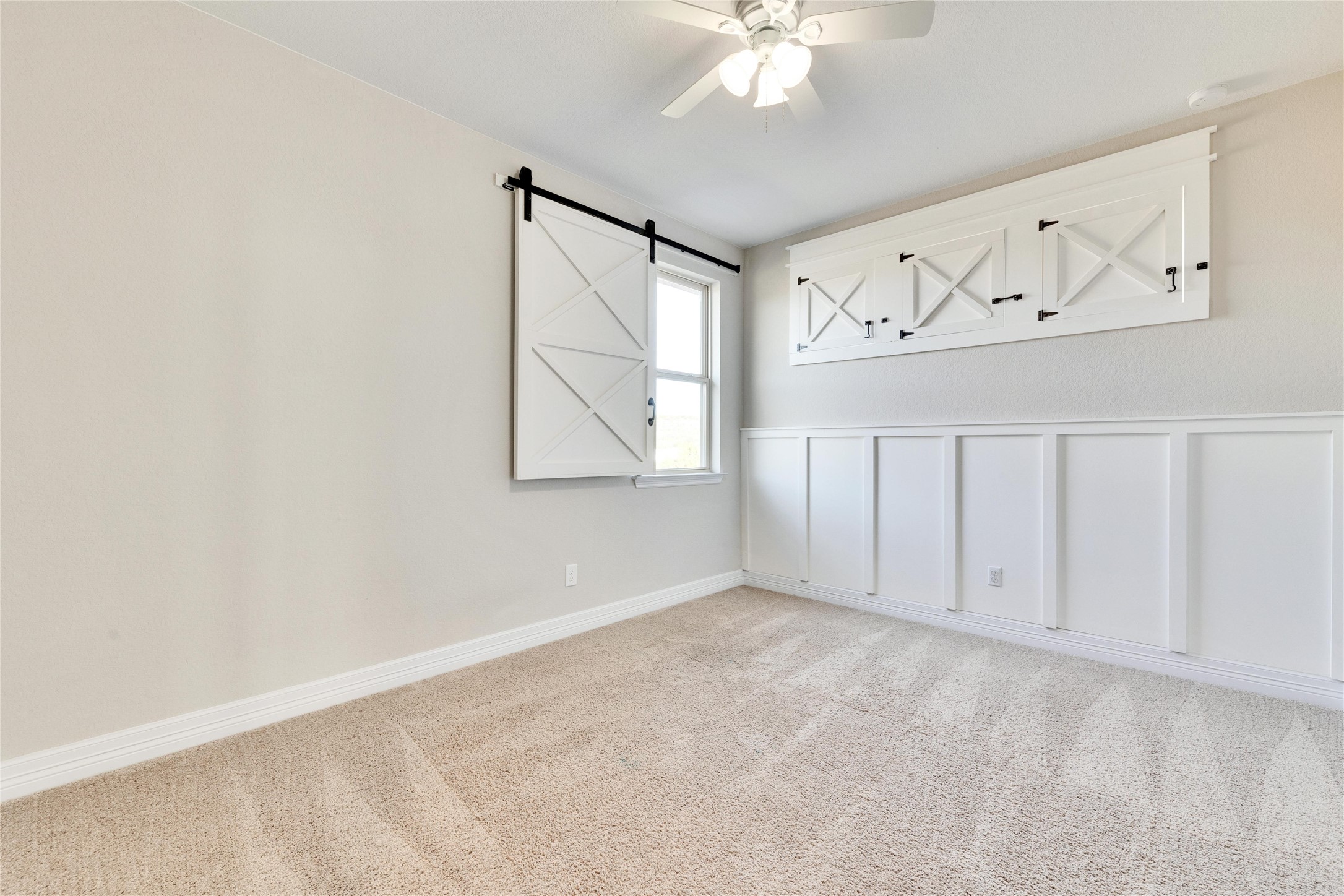5213 Buchanan Draw Road Austin, TX 78738 - Photo 16 of 33 an empty room with windows