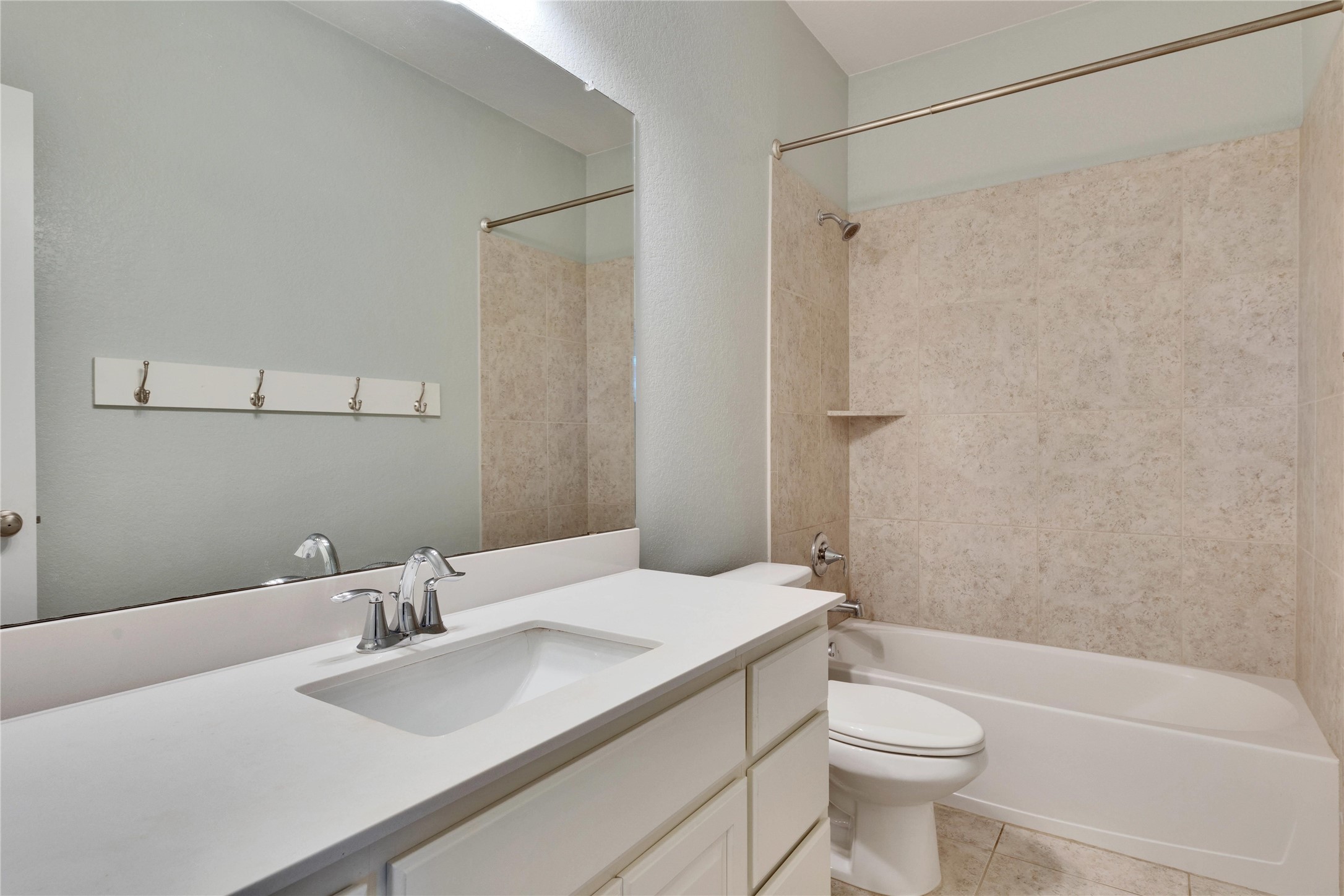 5213 Buchanan Draw Road Austin, TX 78738 - Photo 21 of 33 a bathroom with a sink a toilet and shower