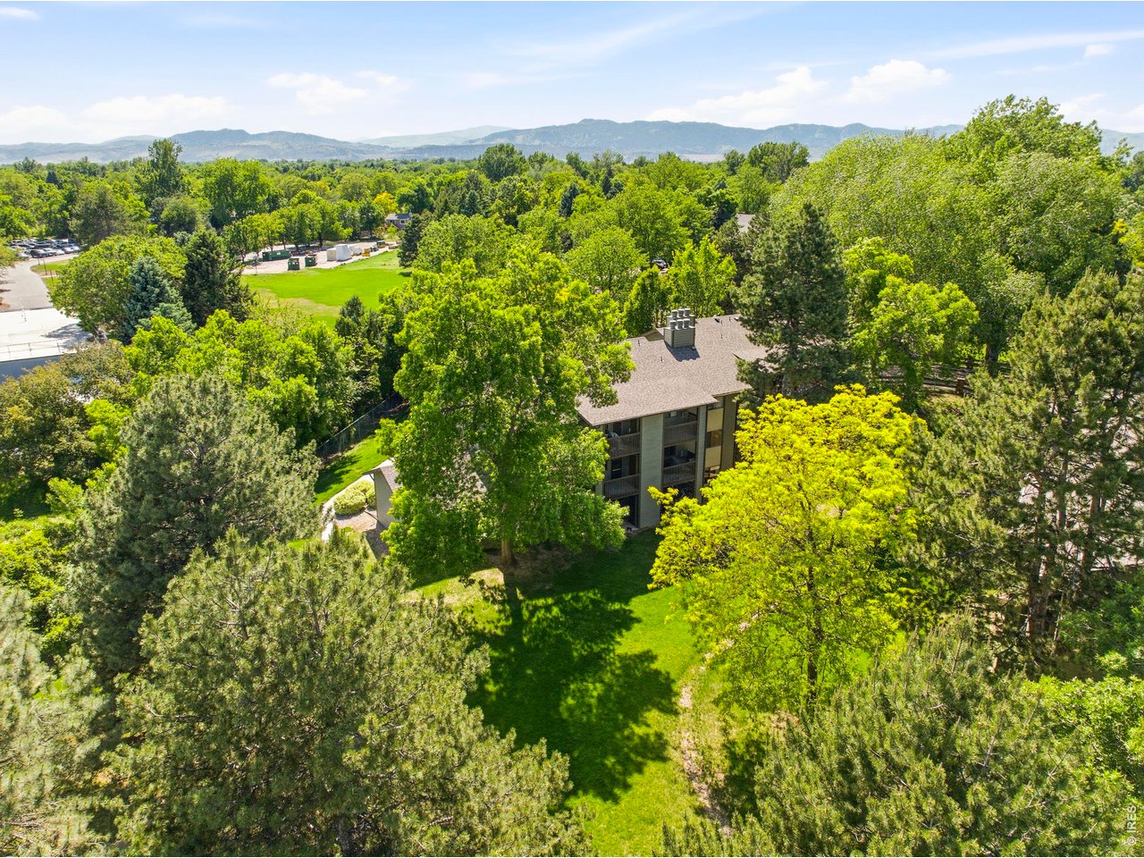 925 Columbia Road, Unit 824 Fort Collins, CO 80525 - Photo 29 of 36 a view of a city with lush green forest