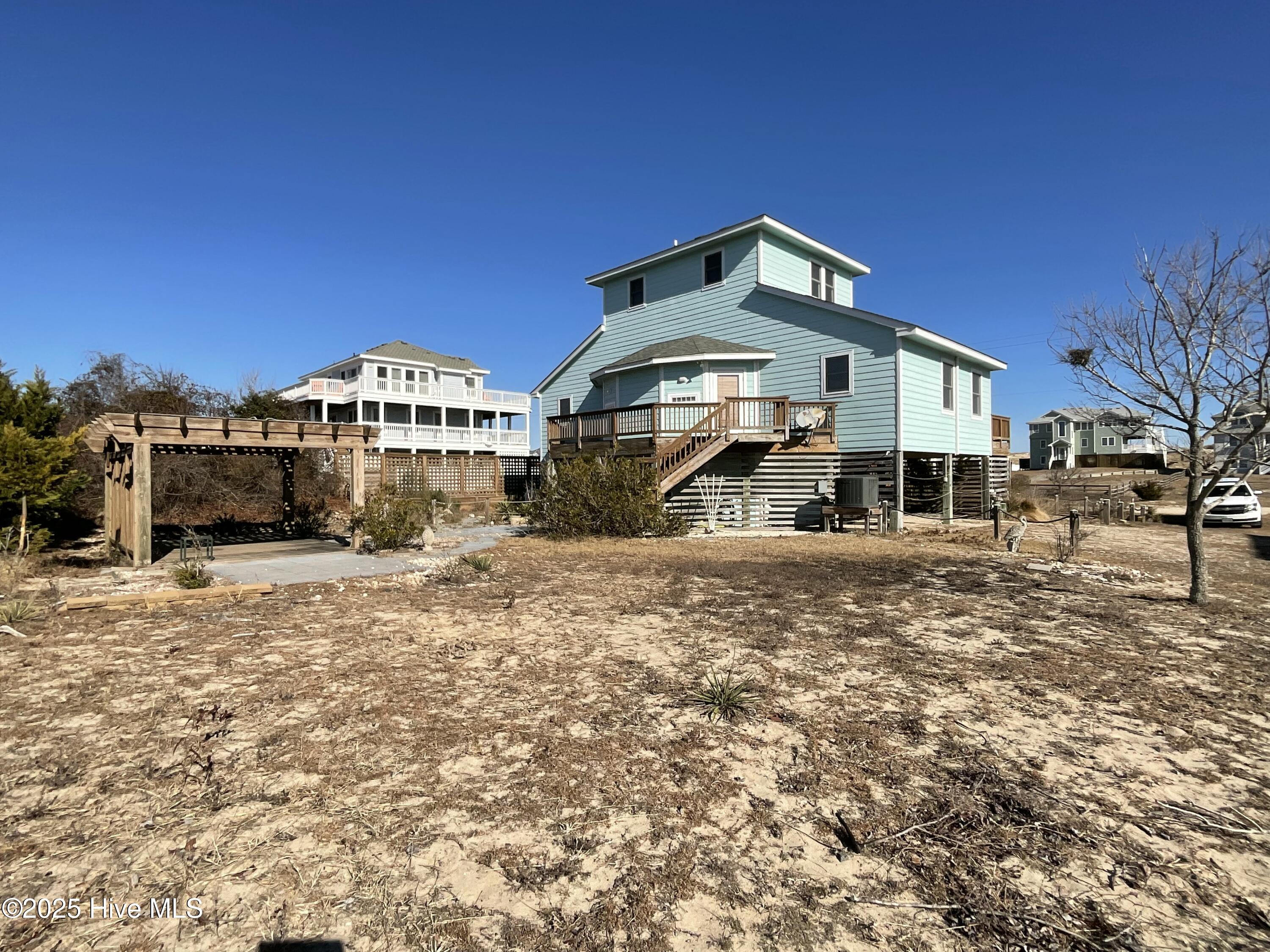 2094 Sandfiddler Road Corolla, NC 27927 - Photo 46 of 62 Side yard