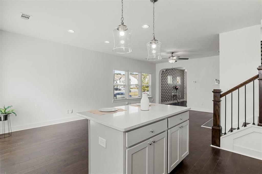 6347 Princeton Ridge Drive Lithonia, GA 30058 - Photo 12 of 28 a bathroom with a sink a vanity and a mirror