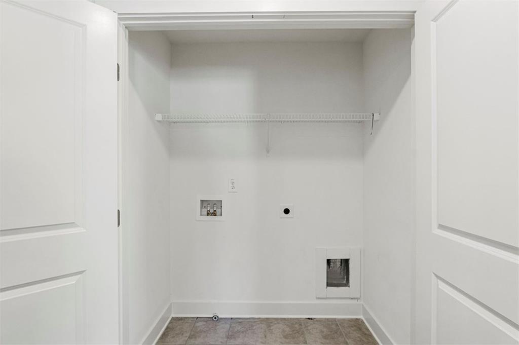 6347 Princeton Ridge Drive Lithonia, GA 30058 - Photo 18 of 28 a view of small space with racks on the wall