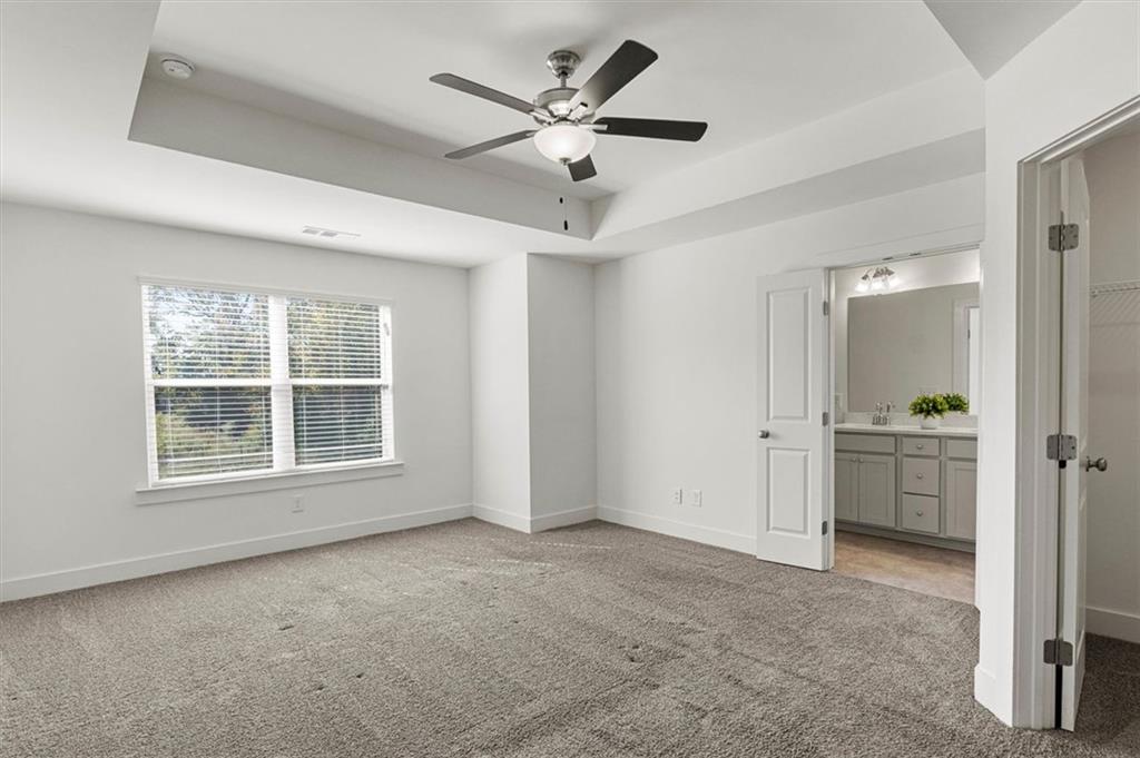 6347 Princeton Ridge Drive Lithonia, GA 30058 - Photo 20 of 28 a view of an empty room with a window
