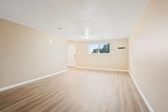 a view of porch with wooden floor
