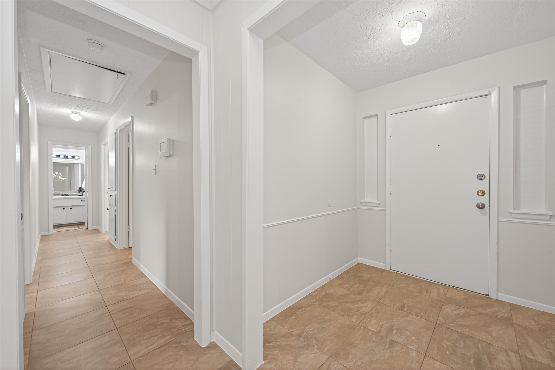 23919 Farm Hill Drive Spring, TX 77373 - Photo 7 of 41 a view of a hallway with wooden floor