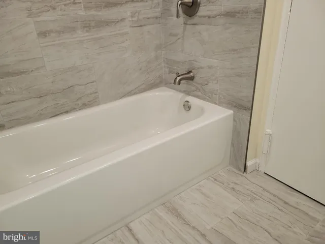 a bathroom with a bathtub