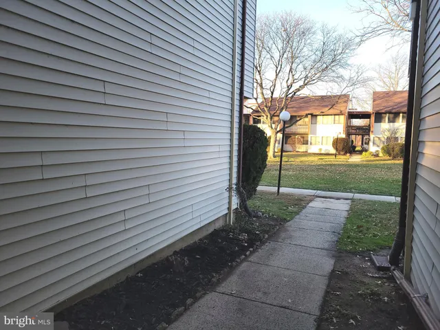a view of a yard with an outdoor space
