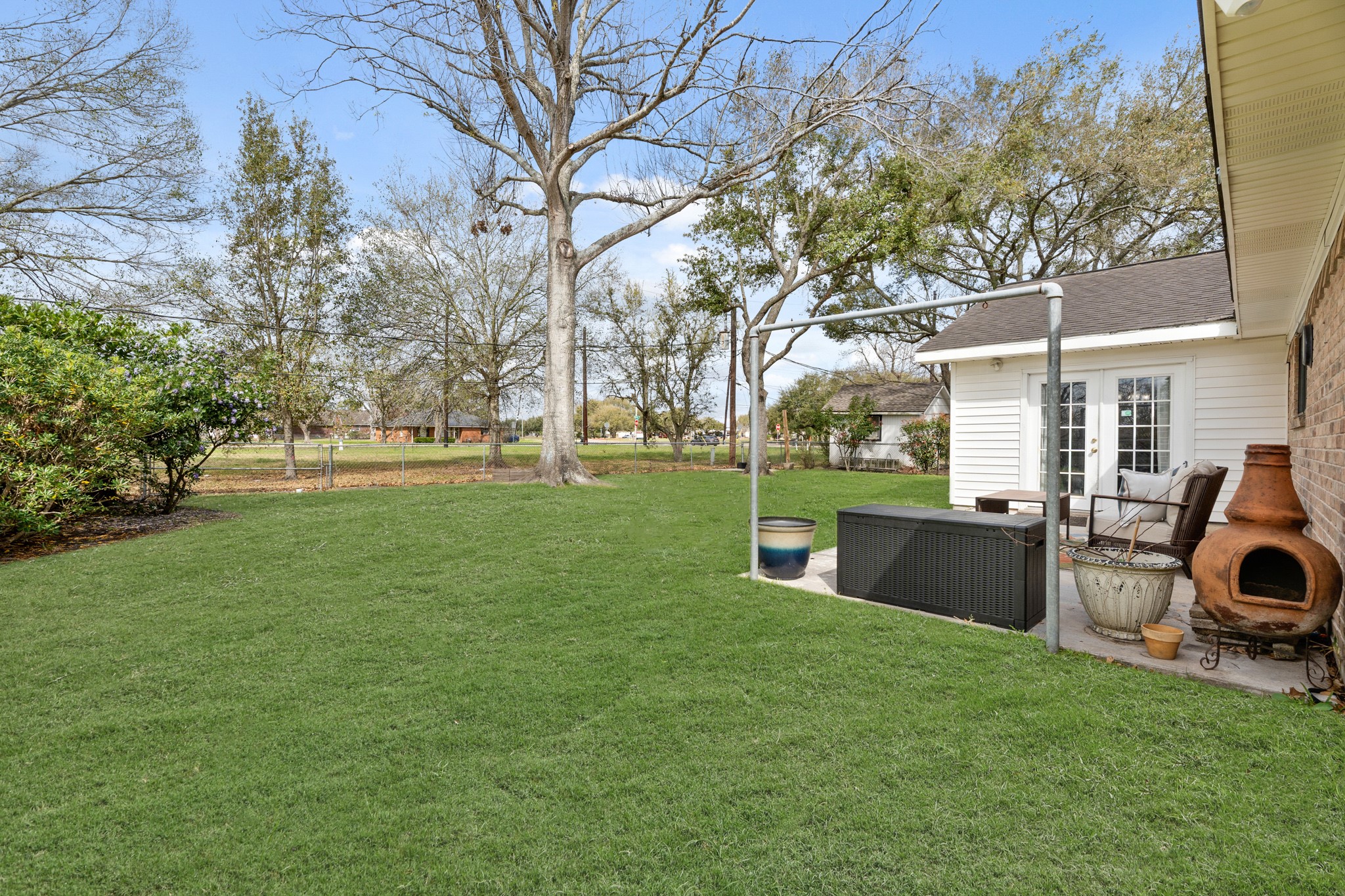 2104 Rose Road Pearland, TX 77581 - Photo 41 of 43 a view of backyard with swimming pool and green space
